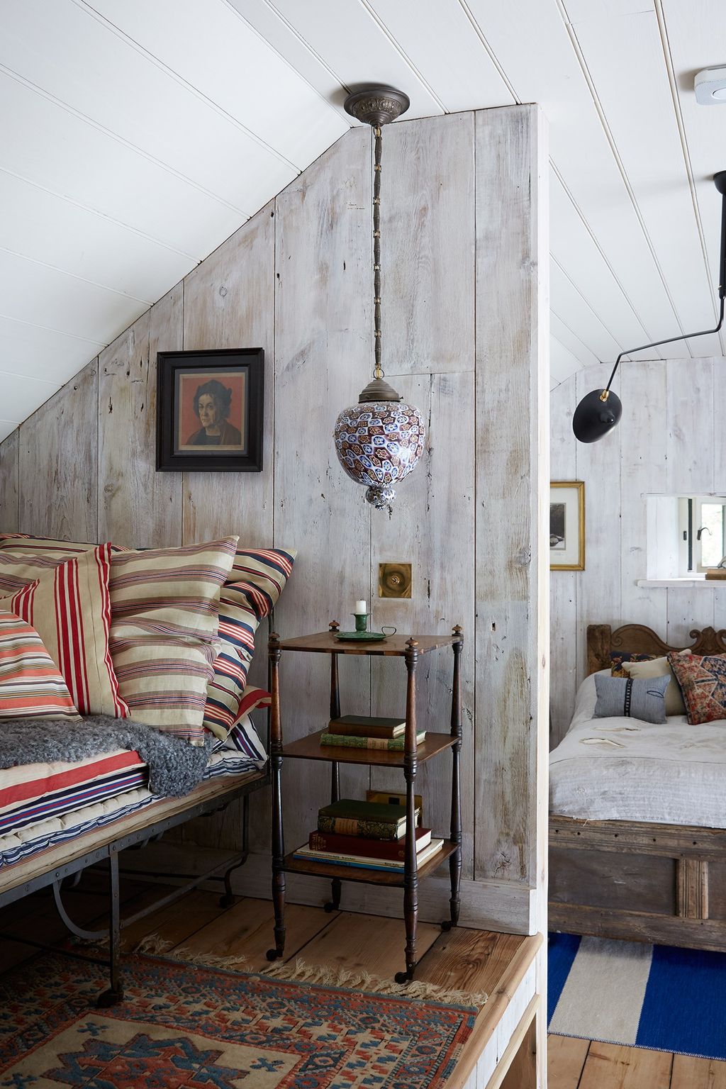 Image may contain Book Indoors Cushion Pillow Housing Building Home Decor Furniture Living Room and Room