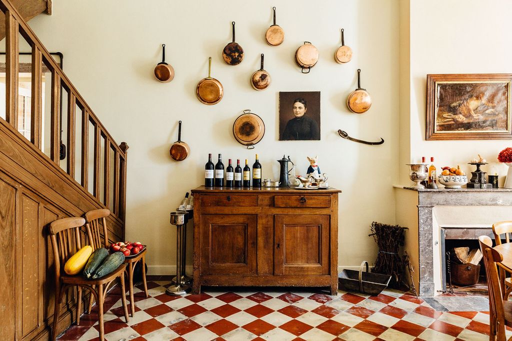 Image may contain Flooring Human Person Floor Wood Hardwood Interior Design Indoors Furniture and Shelf