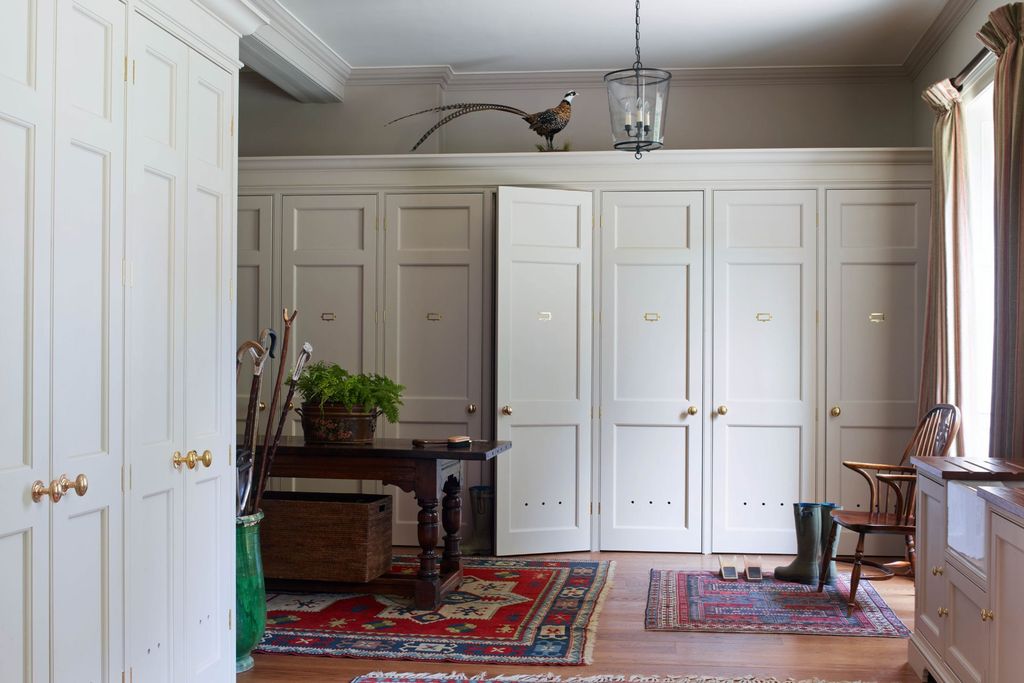 Cupboards line the wall in the boot room.