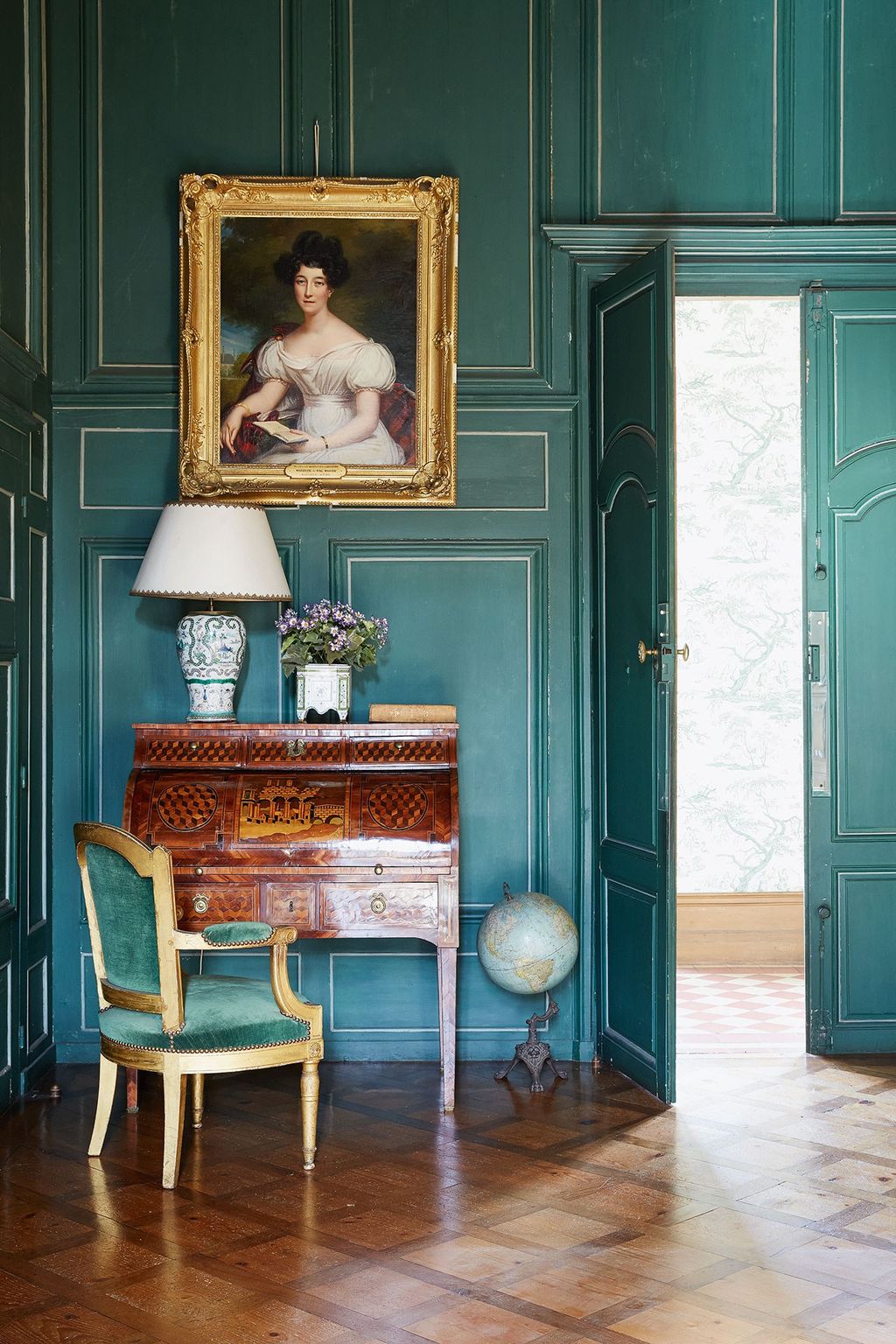 Image may contain Furniture Chair Human Person Interior Design Indoors Lamp and Table Lamp