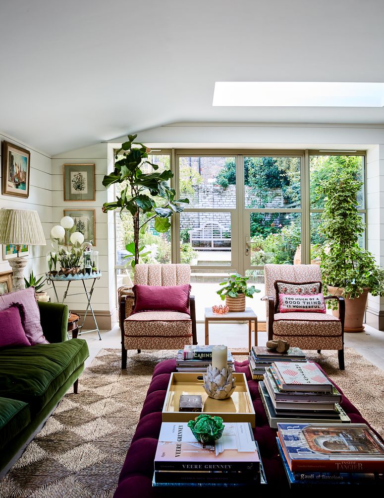 Image may contain: Furniture, Table, Living Room, Room, Indoors, Coffee Table, Cushion, Pillow, Interior Design, and Couch