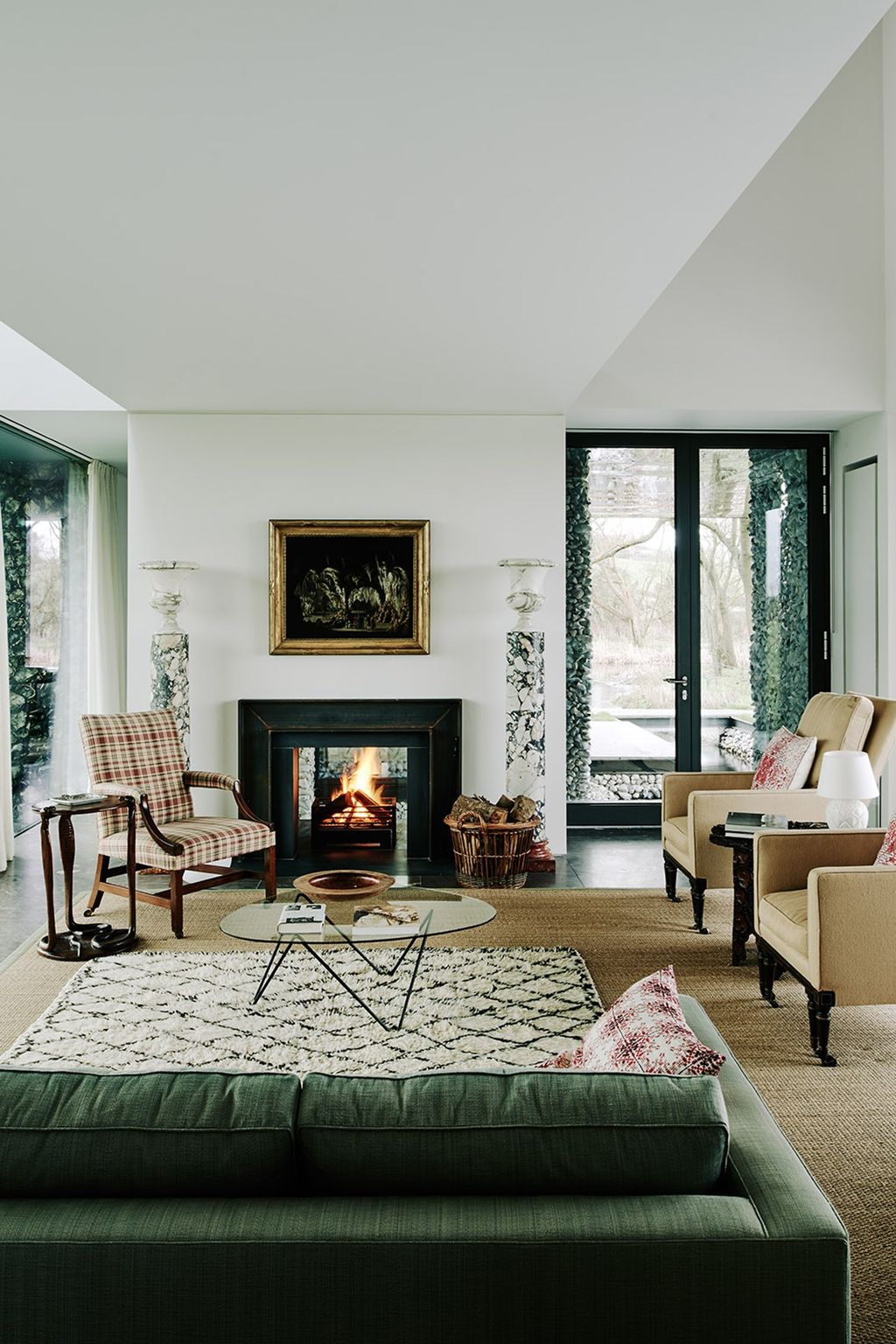 Image may contain Indoors Fireplace Living Room Room Interior Design Hearth Furniture and Rug