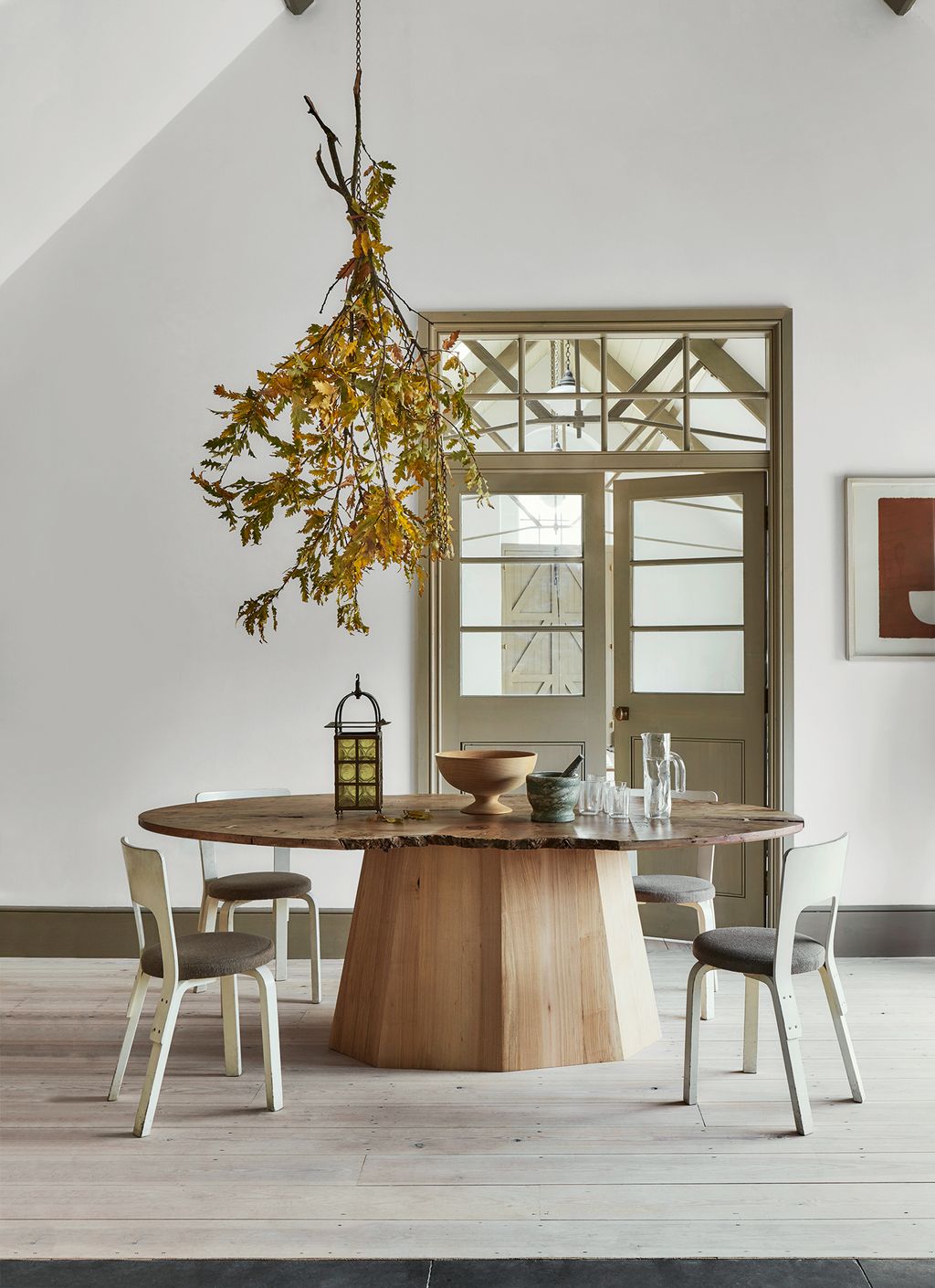 Image may contain Furniture Dining Table Table Wood Chair and Tabletop