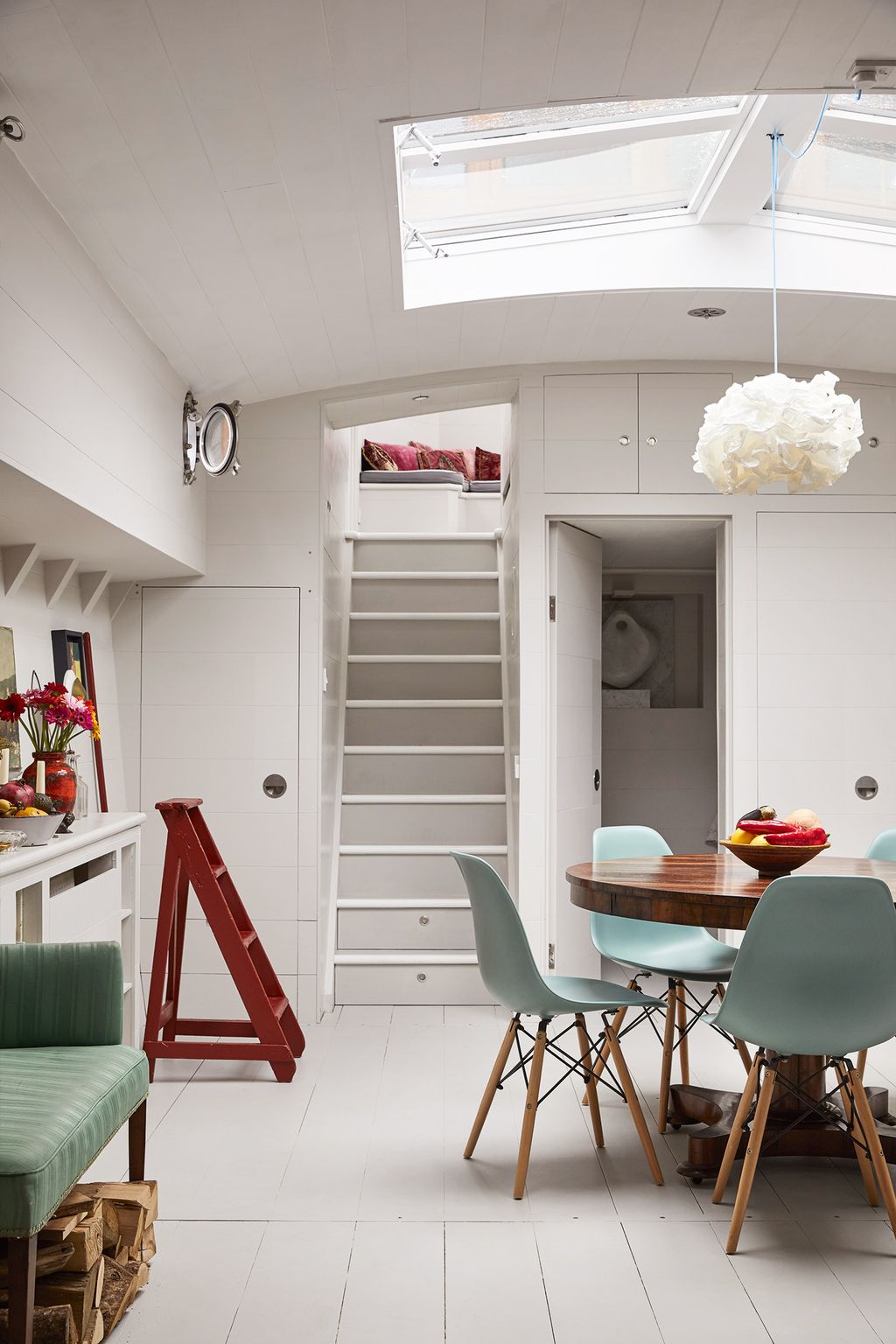 Image may contain Furniture Chair Interior Design Indoors Room Living Room Flooring Housing and Building