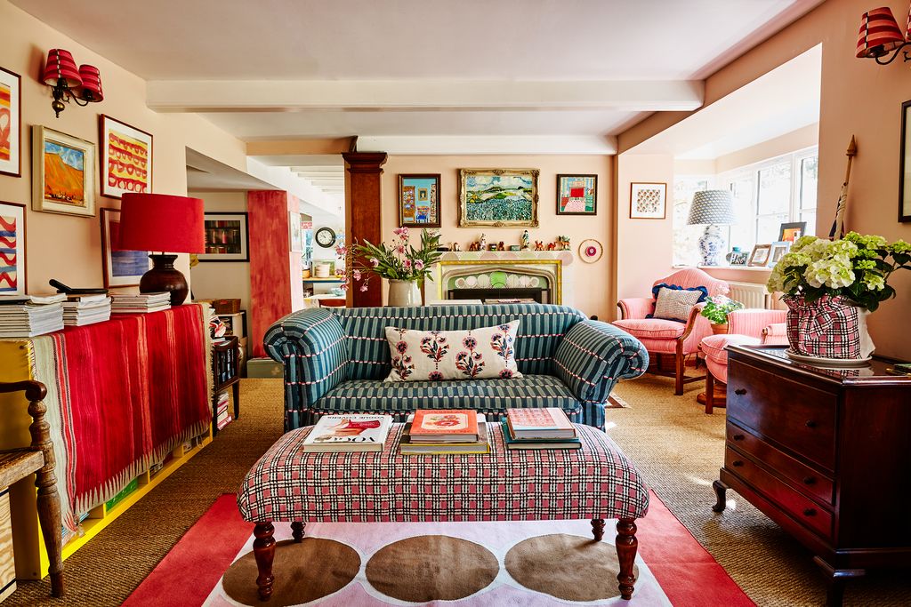 Image may contain Furniture Living Room Indoors Room and Rug