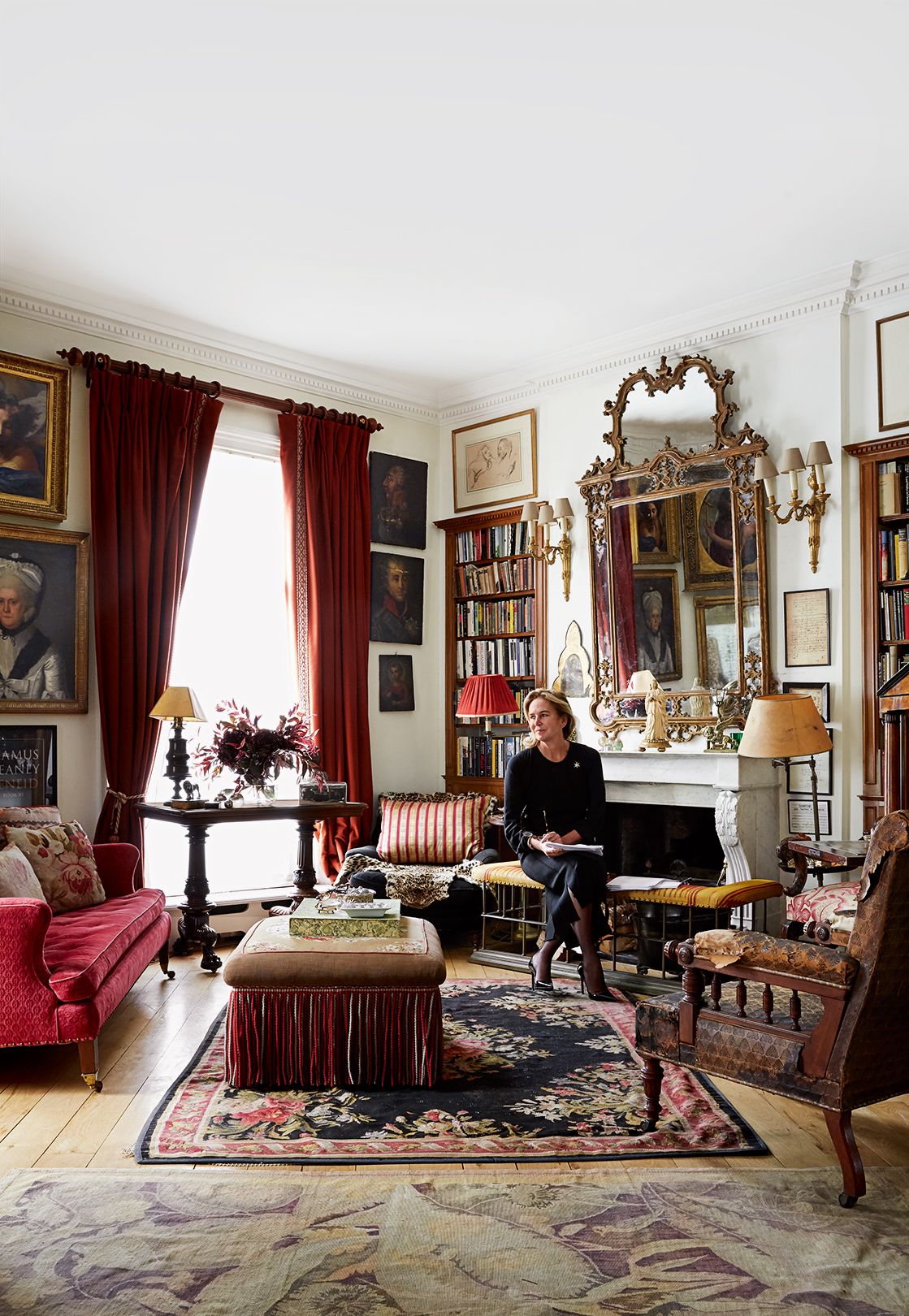 Image may contain Living Room Room Indoors Human Person Furniture Couch Interior Design Rug and Lobby