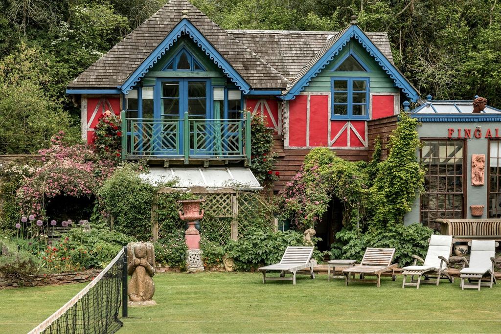 Image may contain Furniture Bench Outdoors Cottage Housing House Building Nature Shelter Countryside and Rural