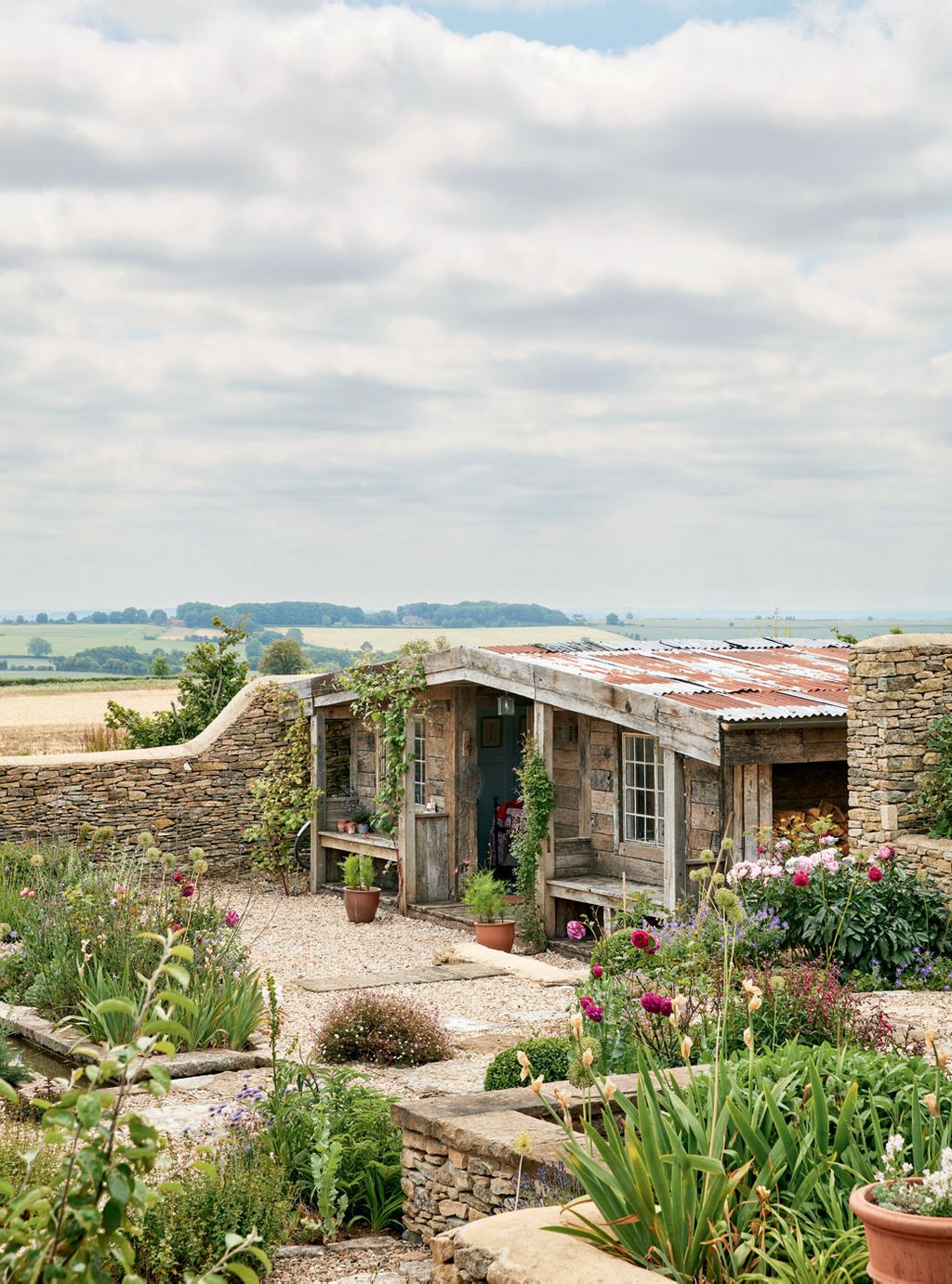 Set within the enclosed garden designed by James AlexanderSinclair this romantic wooden cabin was inspired by a house...