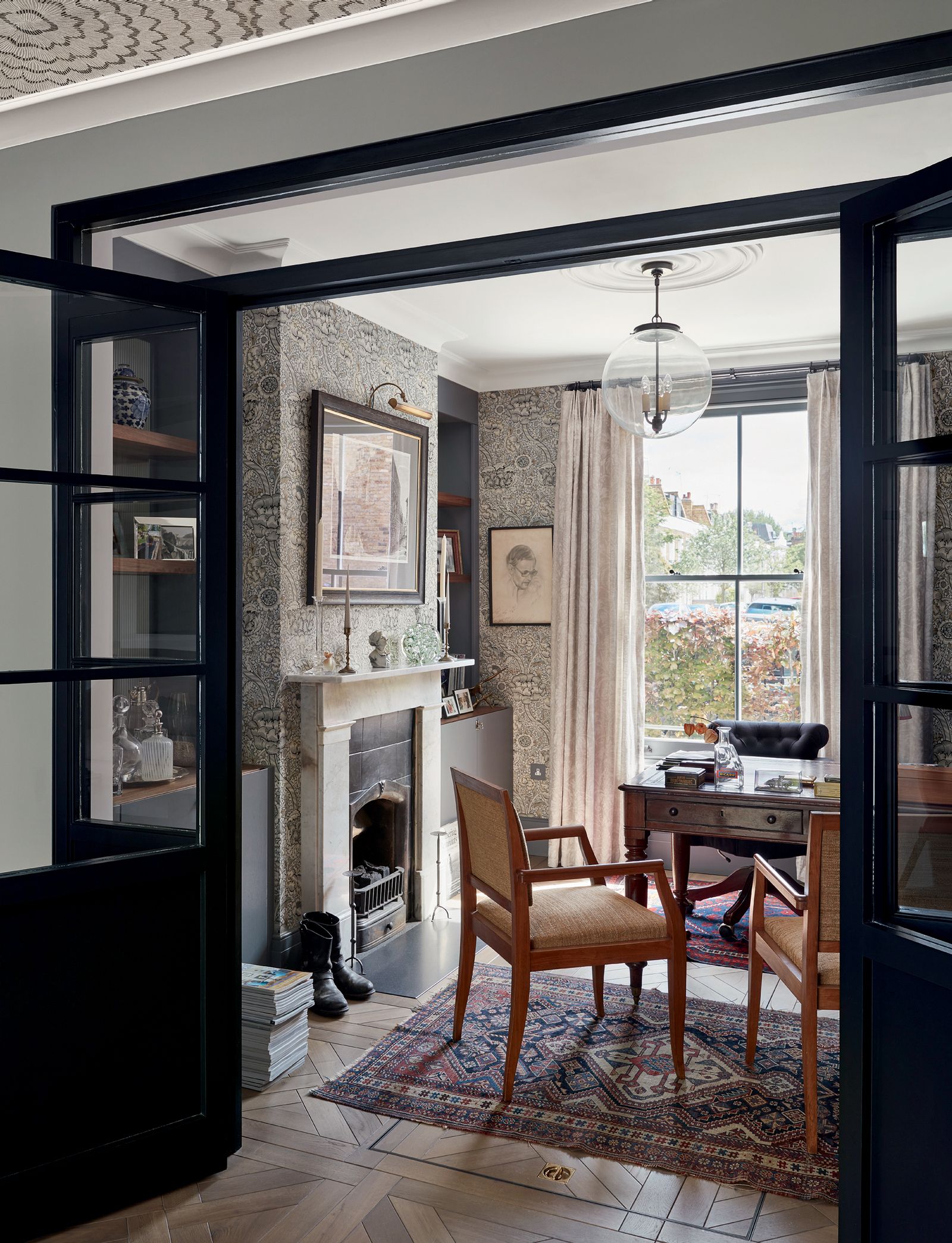 Image may contain Furniture Chair Indoors Fireplace Interior Design and Door