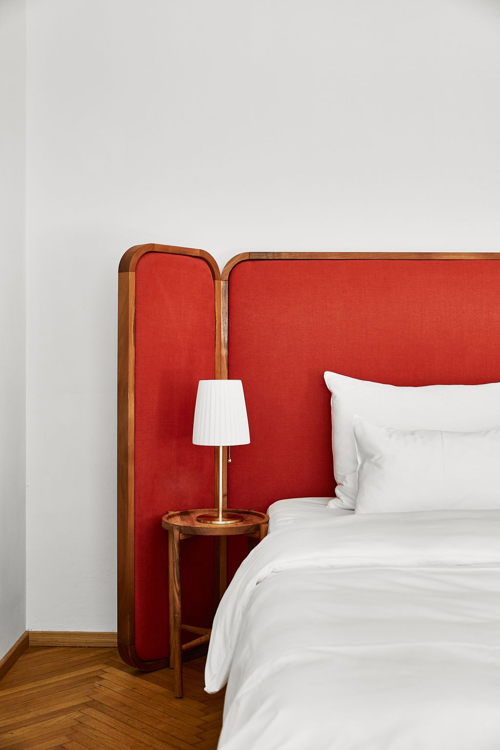 Image may contain Lamp Table Lamp Furniture Bed Cushion and Pillow