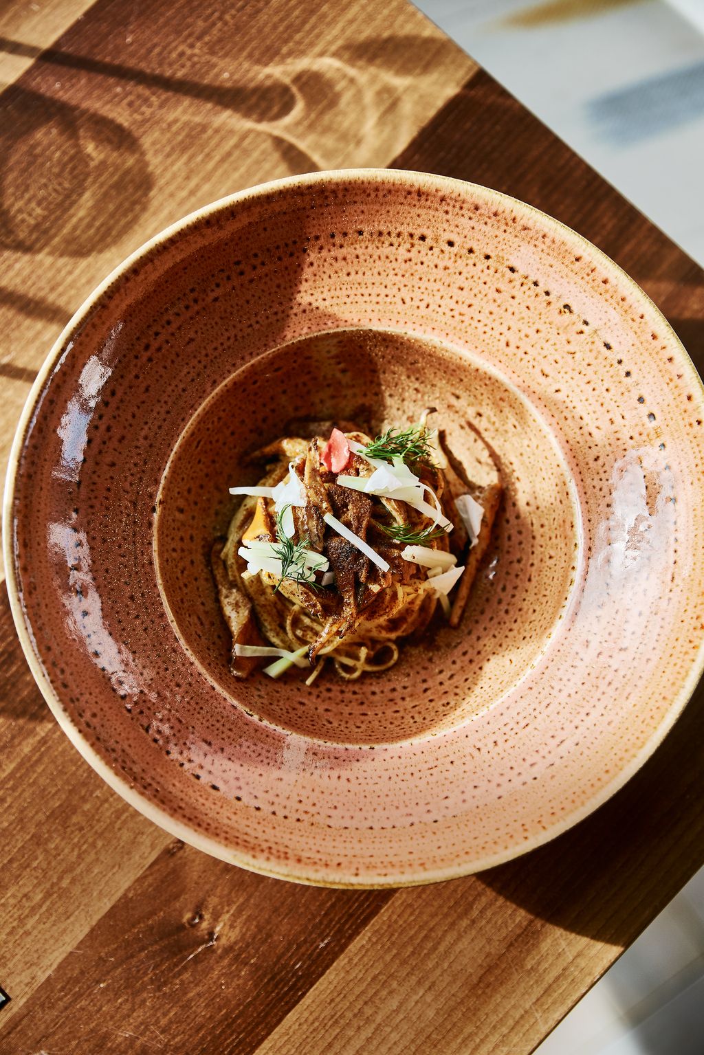 Fresh tagliolini with porcini mushrooms chanterelles and Trentingrana cheese is one of the    dishes at new restaurant...