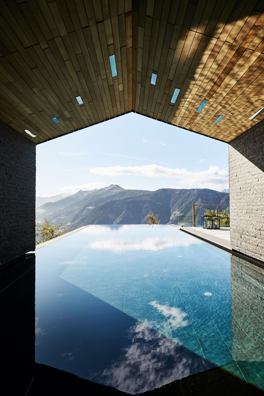 Guests can enjoy spectacular views of the mountains from the infinity pool at the Miramonti Boutique Hotel high up above...