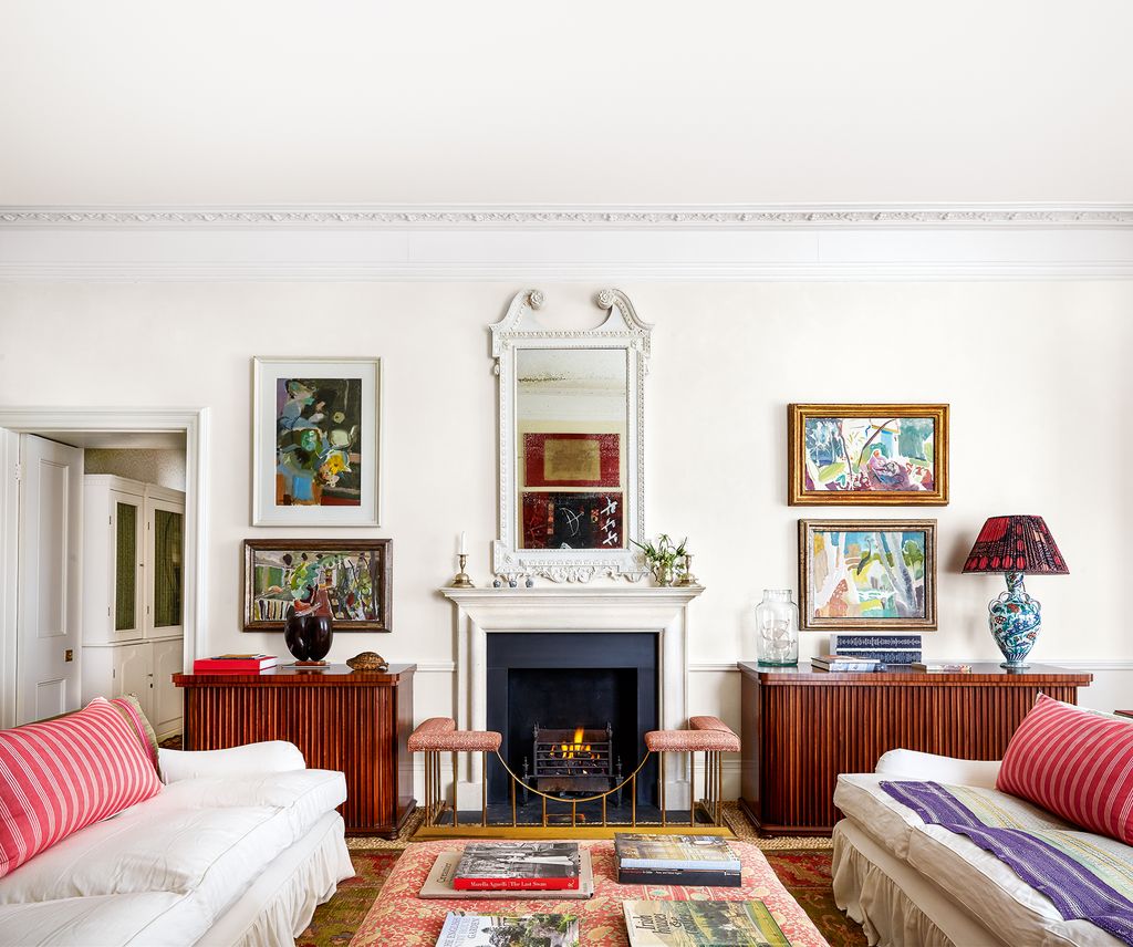 Image may contain Living Room Room Indoors Bedroom Furniture Cushion Pillow Interior Design Couch and Fireplace