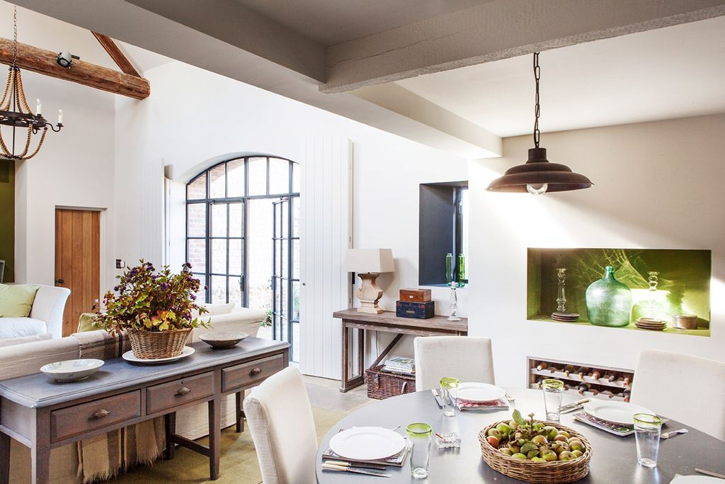 Image may contain Furniture Chair Indoors Room Interior Design Living Room Table Dining Table Tabletop and Wood