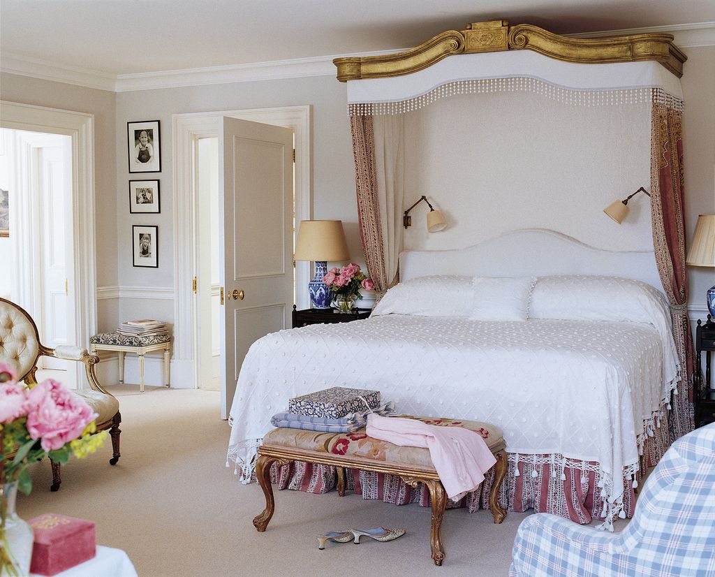 Image may contain Indoors Room Bedroom Furniture Bed Human Person Interior Design and Living Room