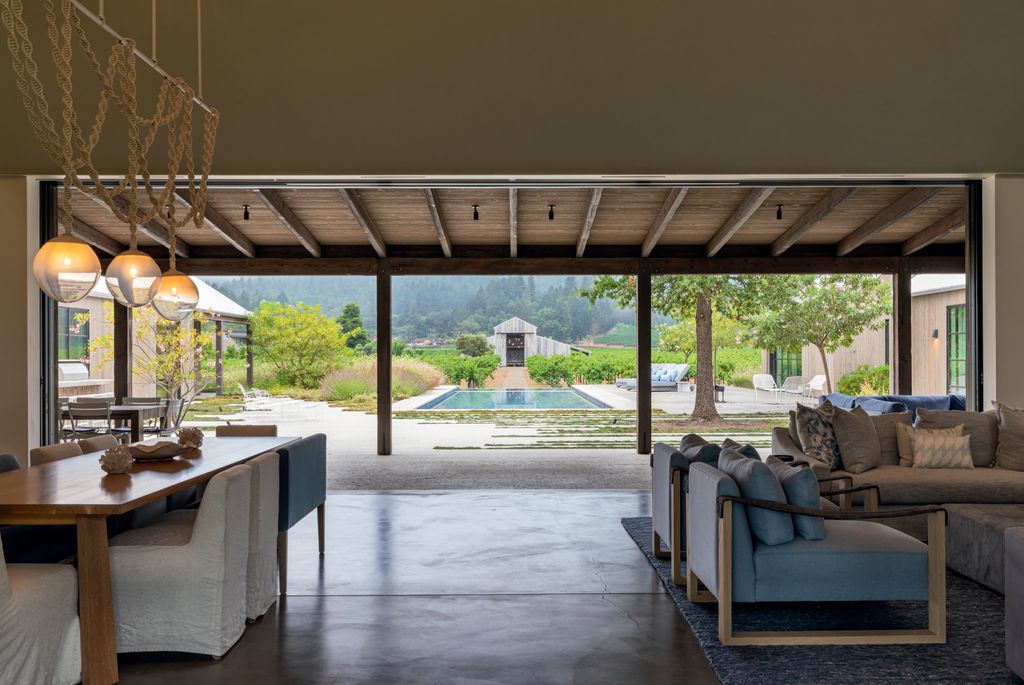 Image may contain Flooring Furniture Porch Patio Wood Floor Pergola and Hardwood