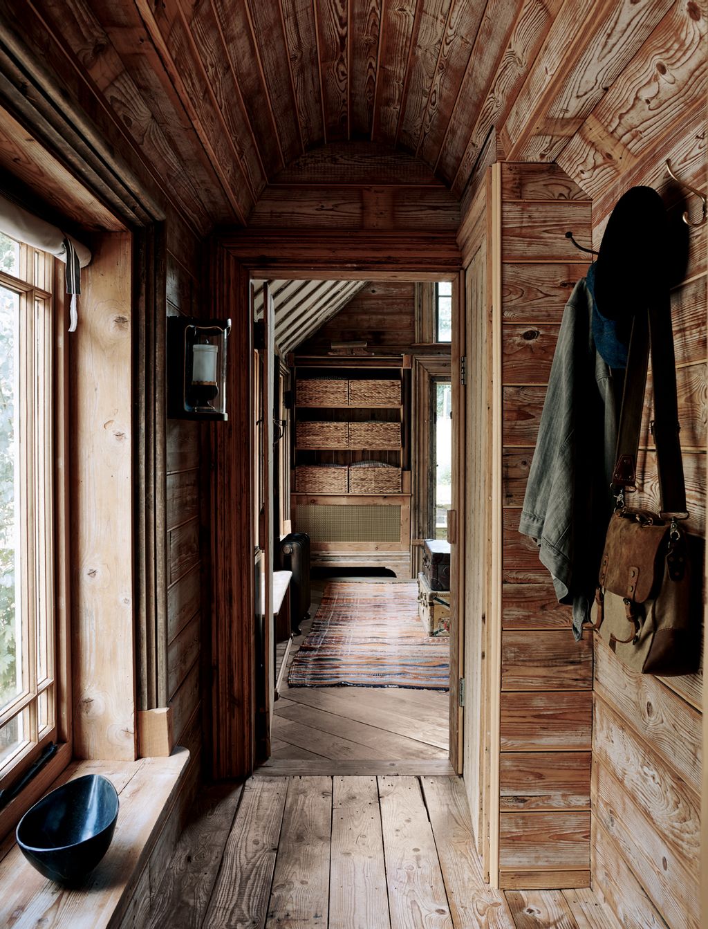 Image may contain Wood Hardwood Indoors Building Housing Flooring Corridor Interior Design and Room