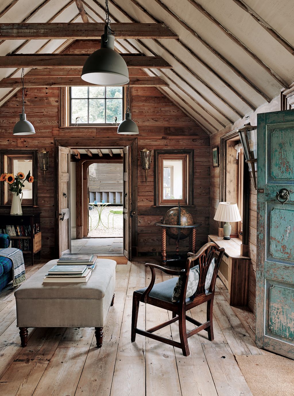 Old roofing battens were fixed to the plaster ceiling to create the impression of rafters.
