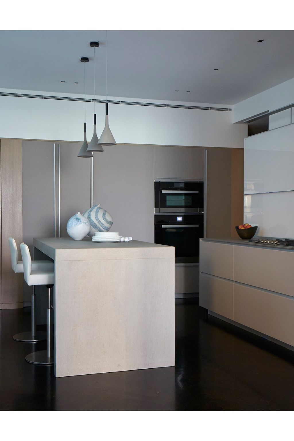 A modern kitchen with clean lines and pale wood counters.  Like this Then you'll love  Real Homes A Modern Rothschild House