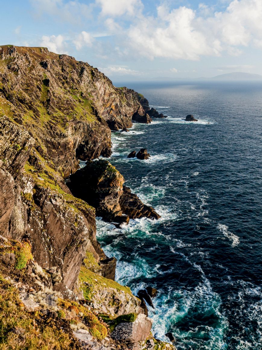 Image may contain Promontory Nature Outdoors Water Sea Ocean and Cliff