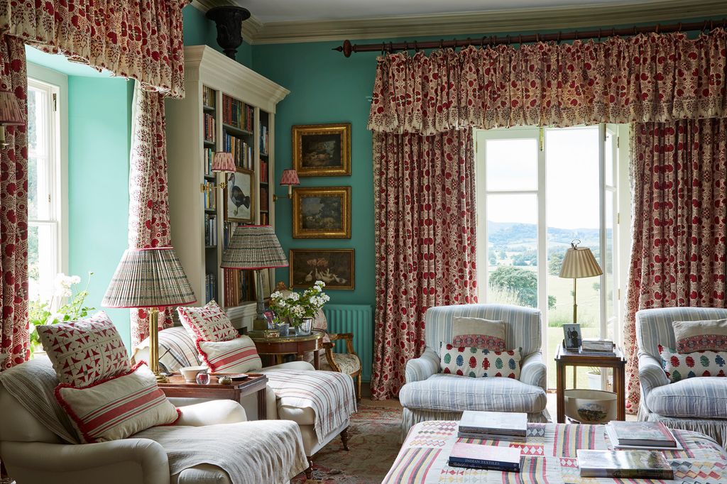 Image may contain Living Room Indoors Room Furniture Couch and Interior Design