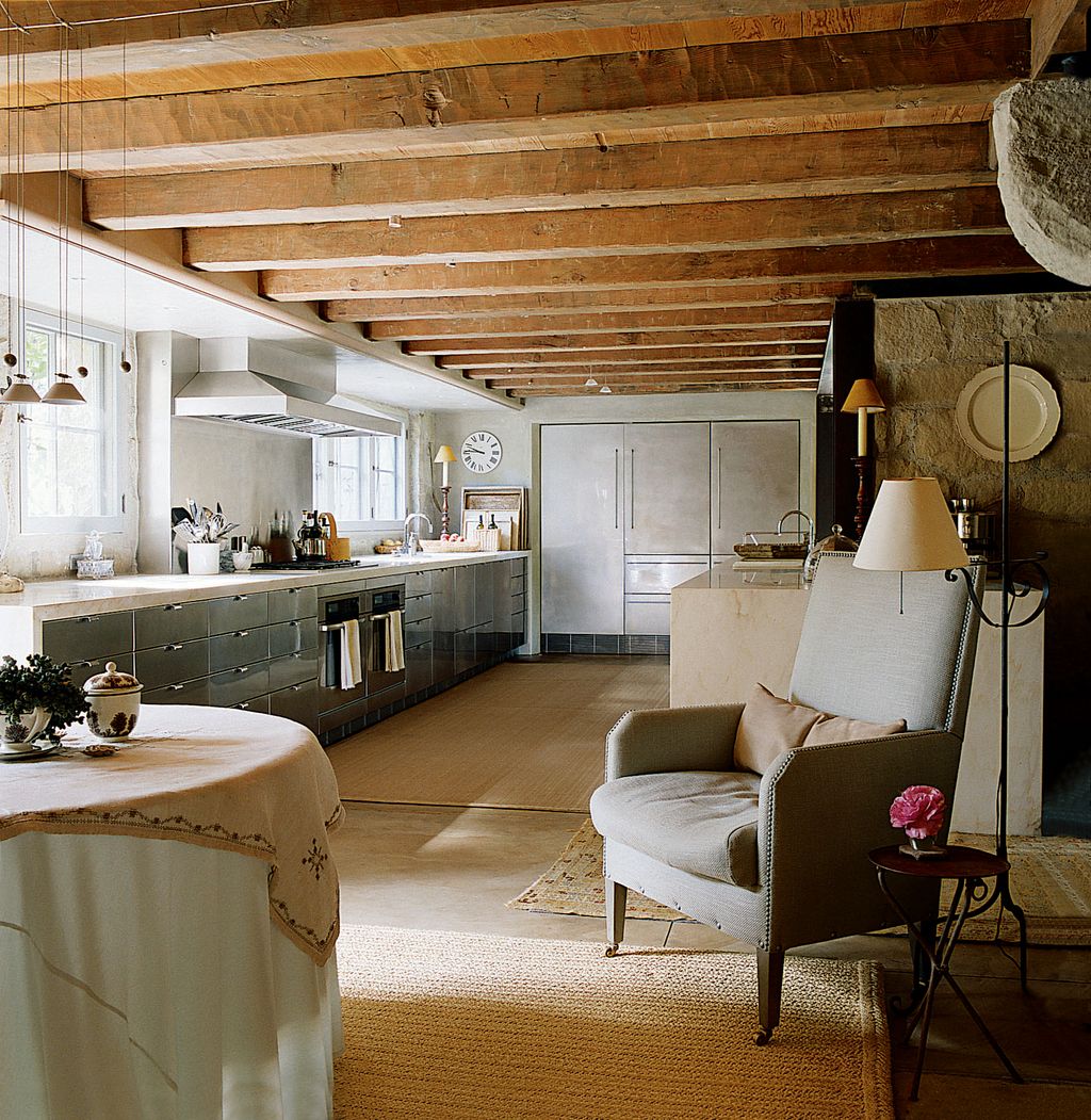 Image may contain Indoors Furniture Living Room Room Flooring Wood Couch Housing and Building