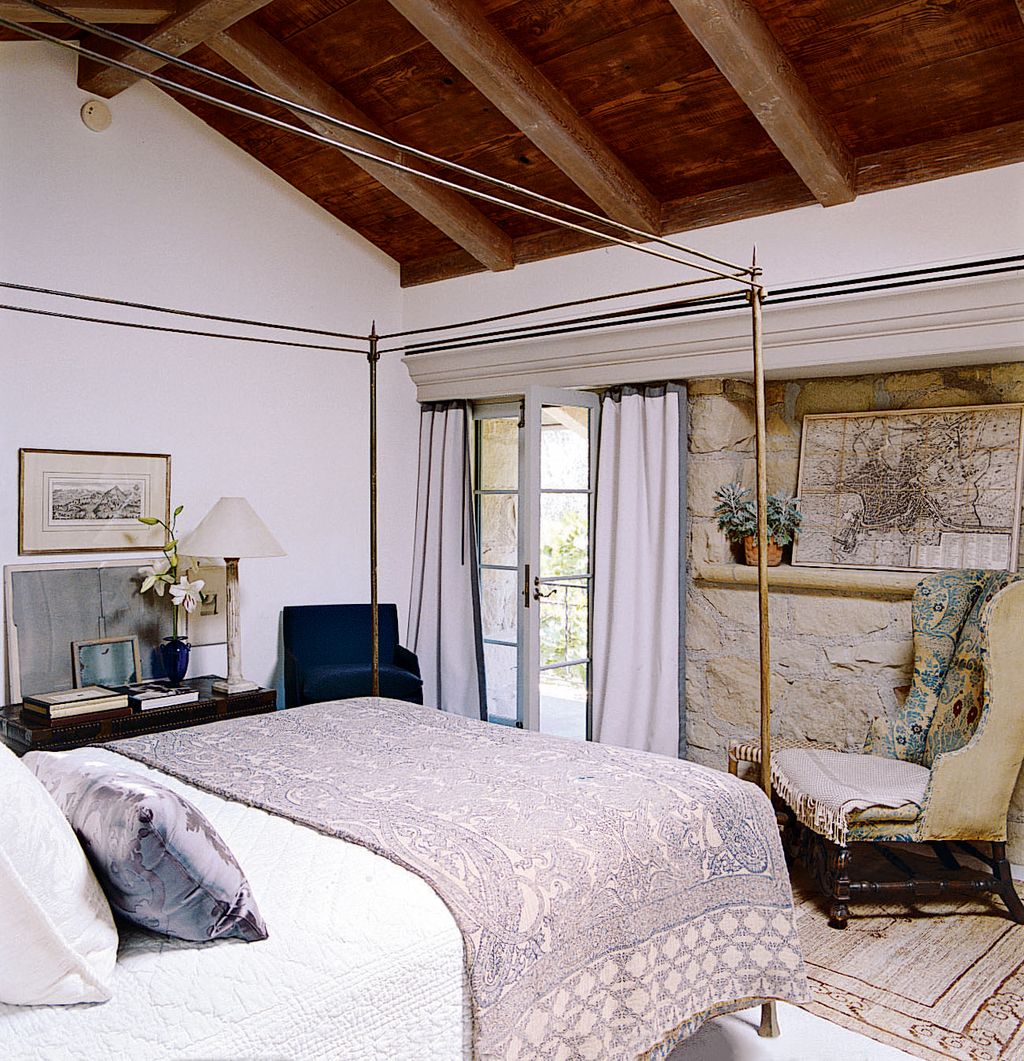 Image may contain Furniture Indoors Interior Design Room Bedroom Flooring Bed Housing Building and Wood