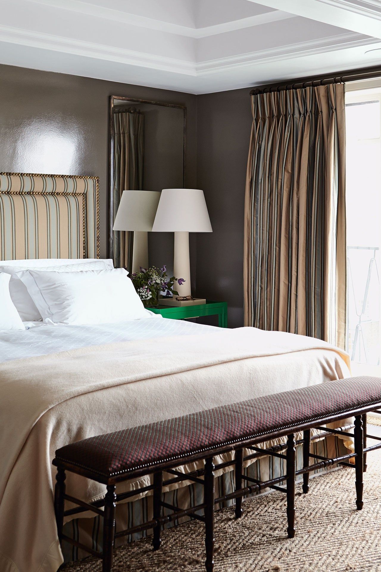 The bedroom of a London flat by Adam