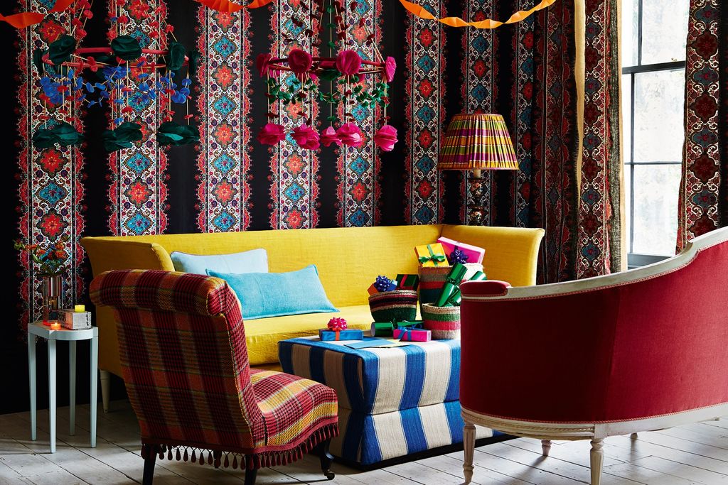 Image may contain Furniture Couch Living Room Indoors Room Chair and Interior Design