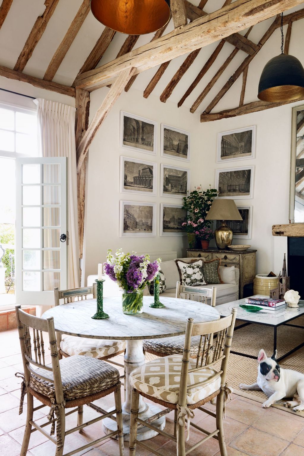 Image may contain Furniture Chair Table Indoors Room Living Room Interior Design Coffee Table Plant and Housing