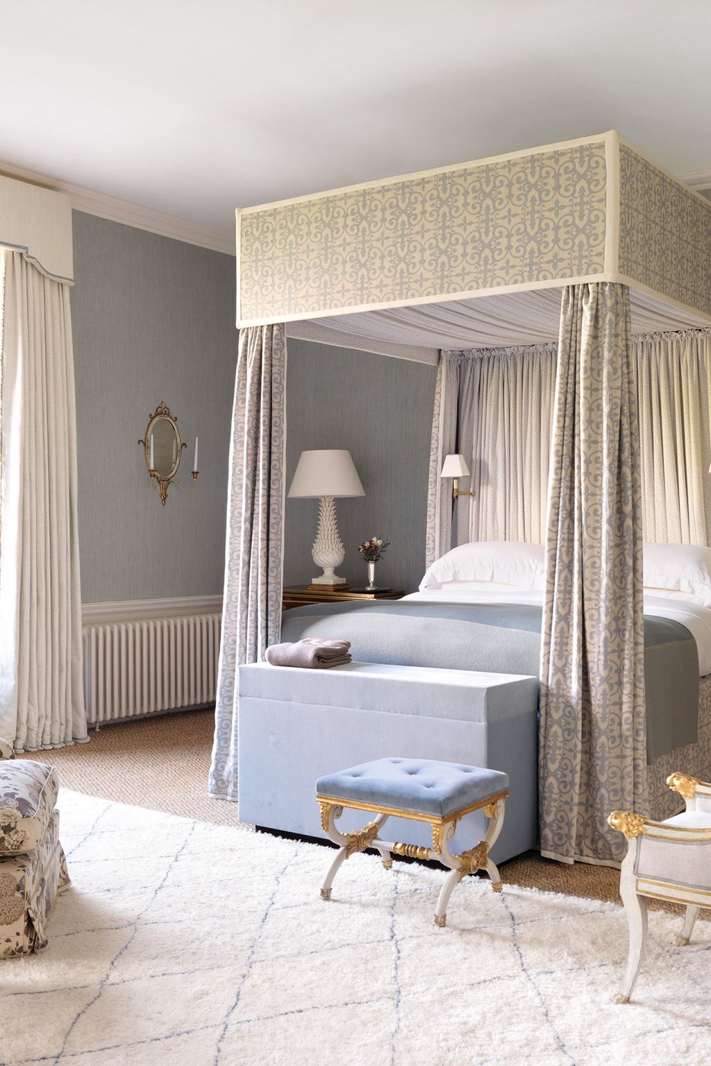 Image may contain Furniture Indoors Room Bedroom Interior Design Bed Living Room and Home Decor