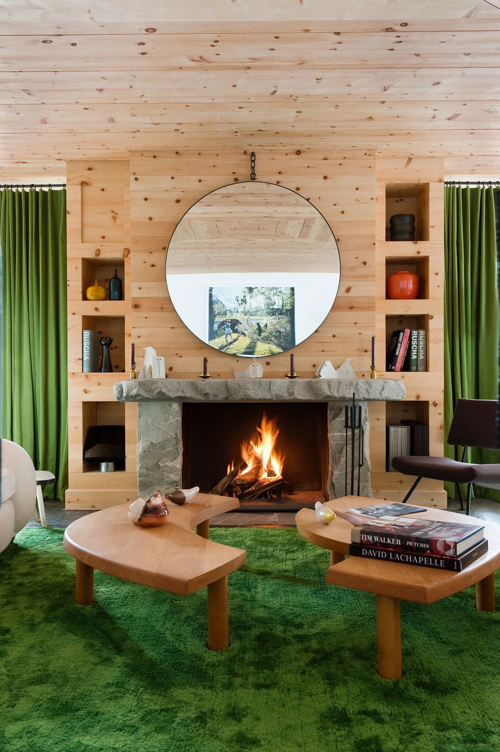 Image may contain Fireplace Indoors Living Room Room Hearth Furniture Chair Interior Design Home Decor and Table