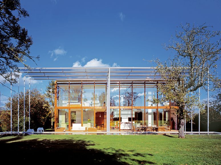 Image may contain: Grass, Plant, Building, Campus, Lawn, and Office Building