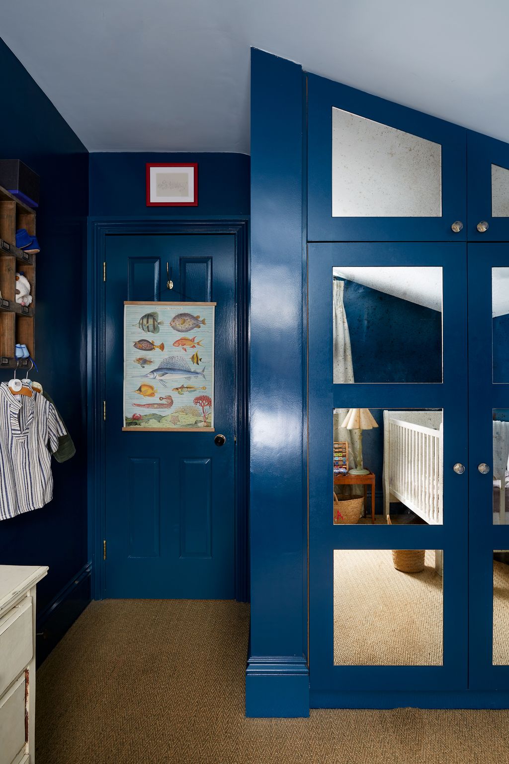 Image may contain Furniture Door Cupboard Closet Shelf Interior Design and Indoors