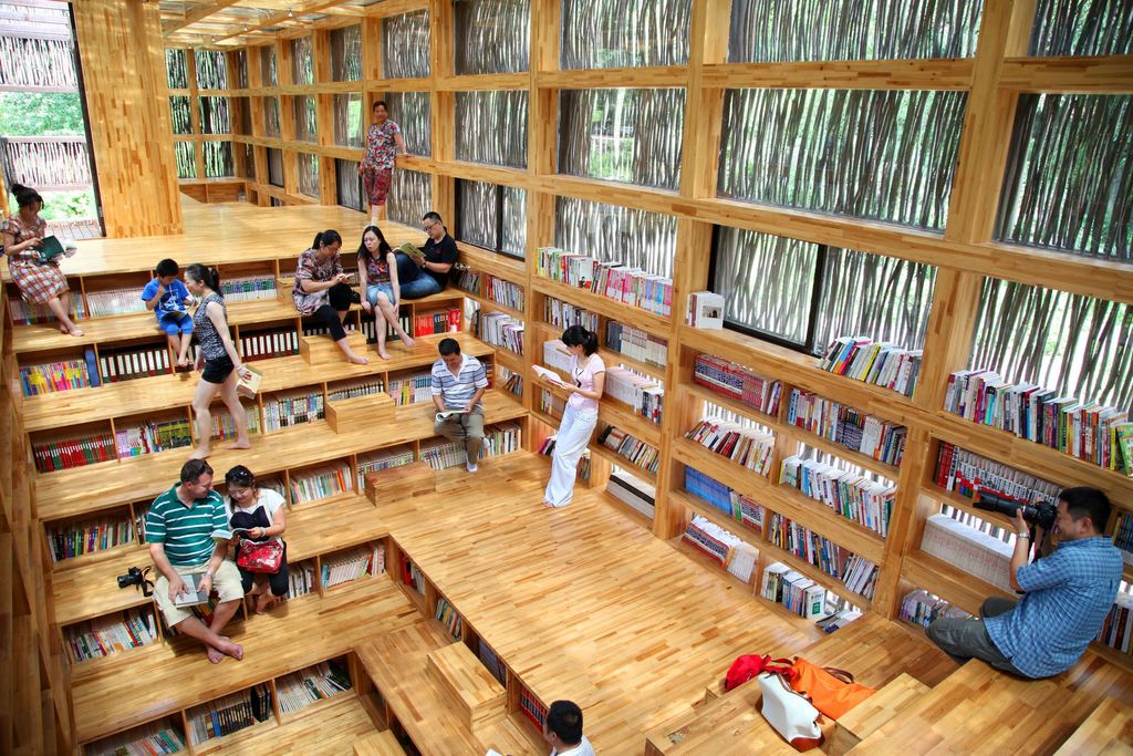 In the village of Huairou on the outskirts of Beijing this serene library with its timber frame blends seamlessly into...