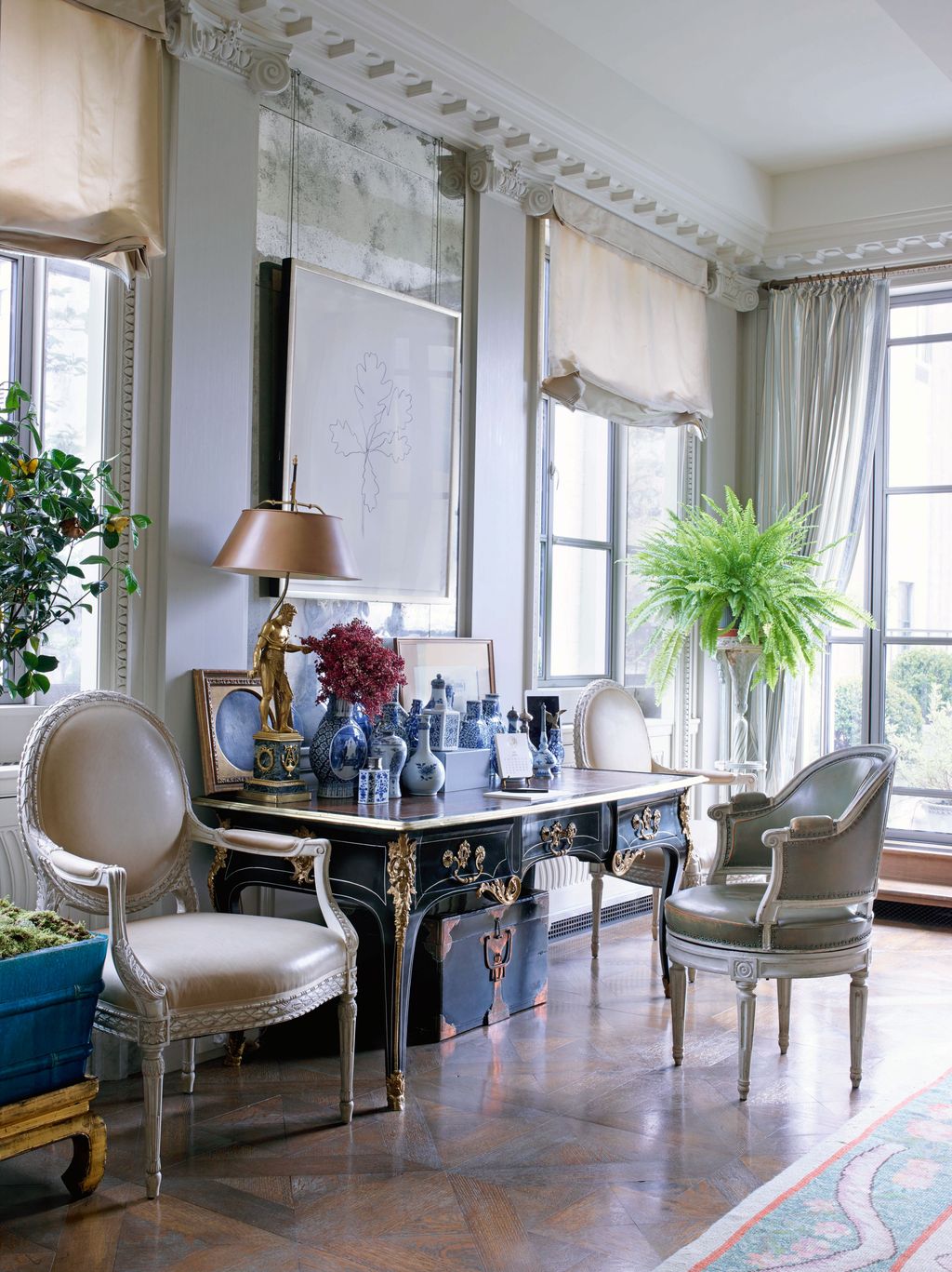 Image may contain Furniture Chair Living Room Room Indoors Interior Design Lamp Table Lamp and Table