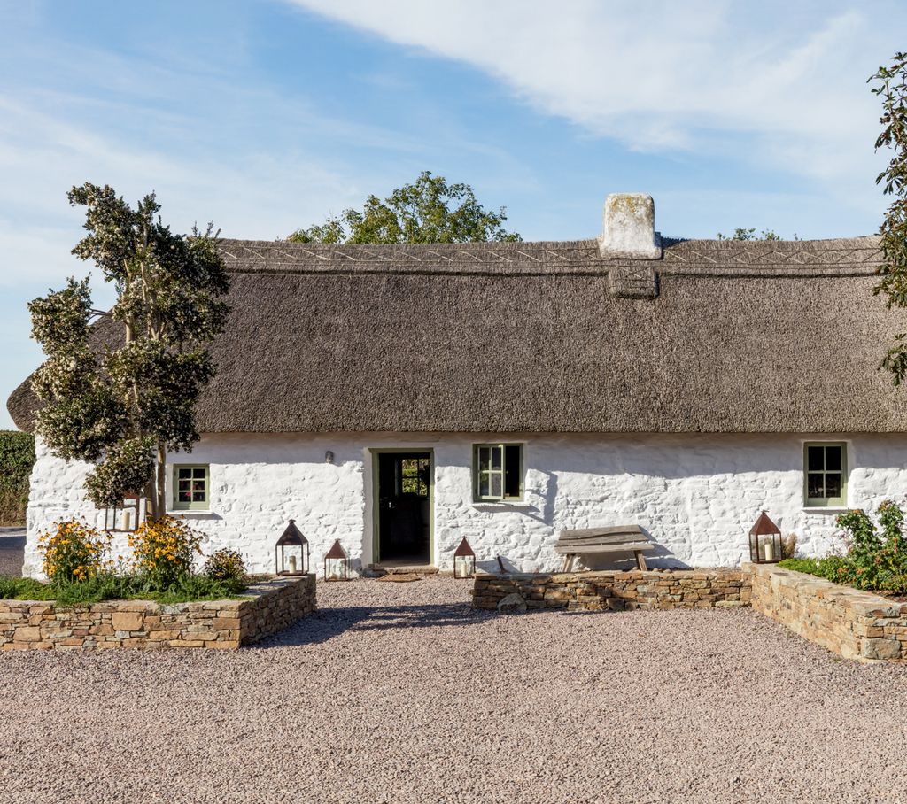 The 18thcentury house and farm buildings are arranged around a courtyard.