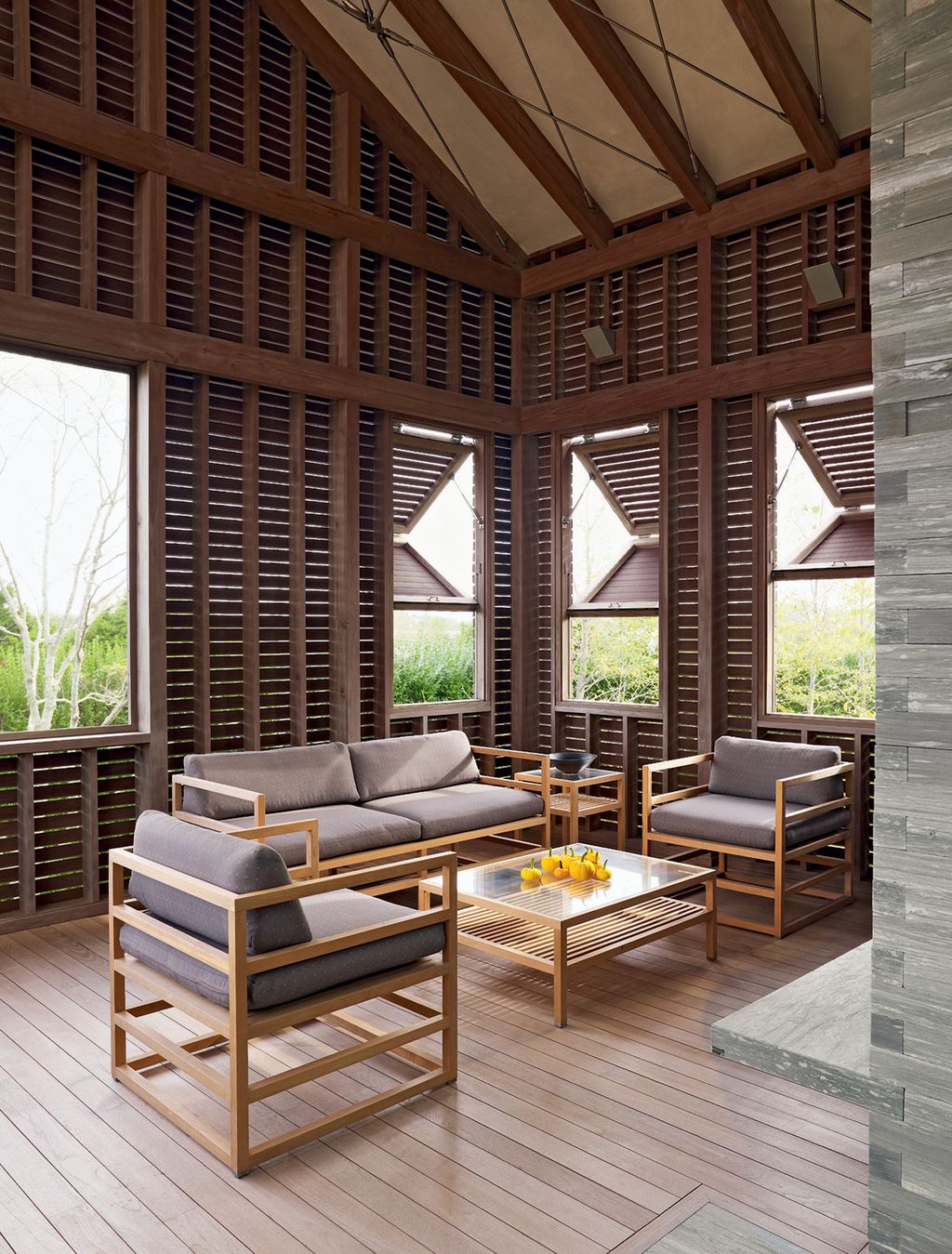 Image may contain Furniture Wood Table Home Decor Interior Design Indoors Hardwood Coffee Table Rug and Room