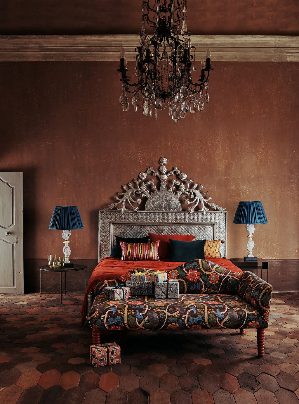 Image may contain Furniture Lamp Chandelier Indoors Room Living Room Interior Design and Table Lamp