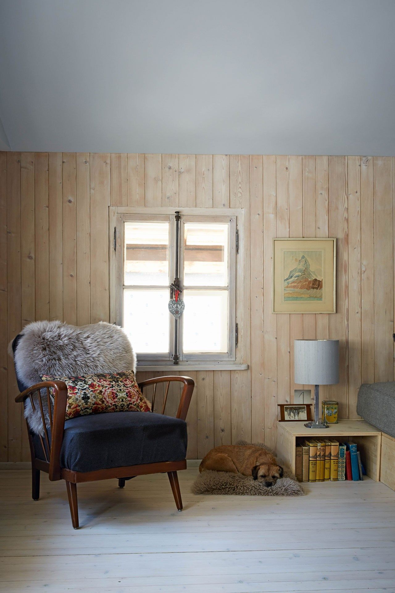 Image may contain Furniture Chair Living Room Room Indoors Interior Design Wood and Armchair