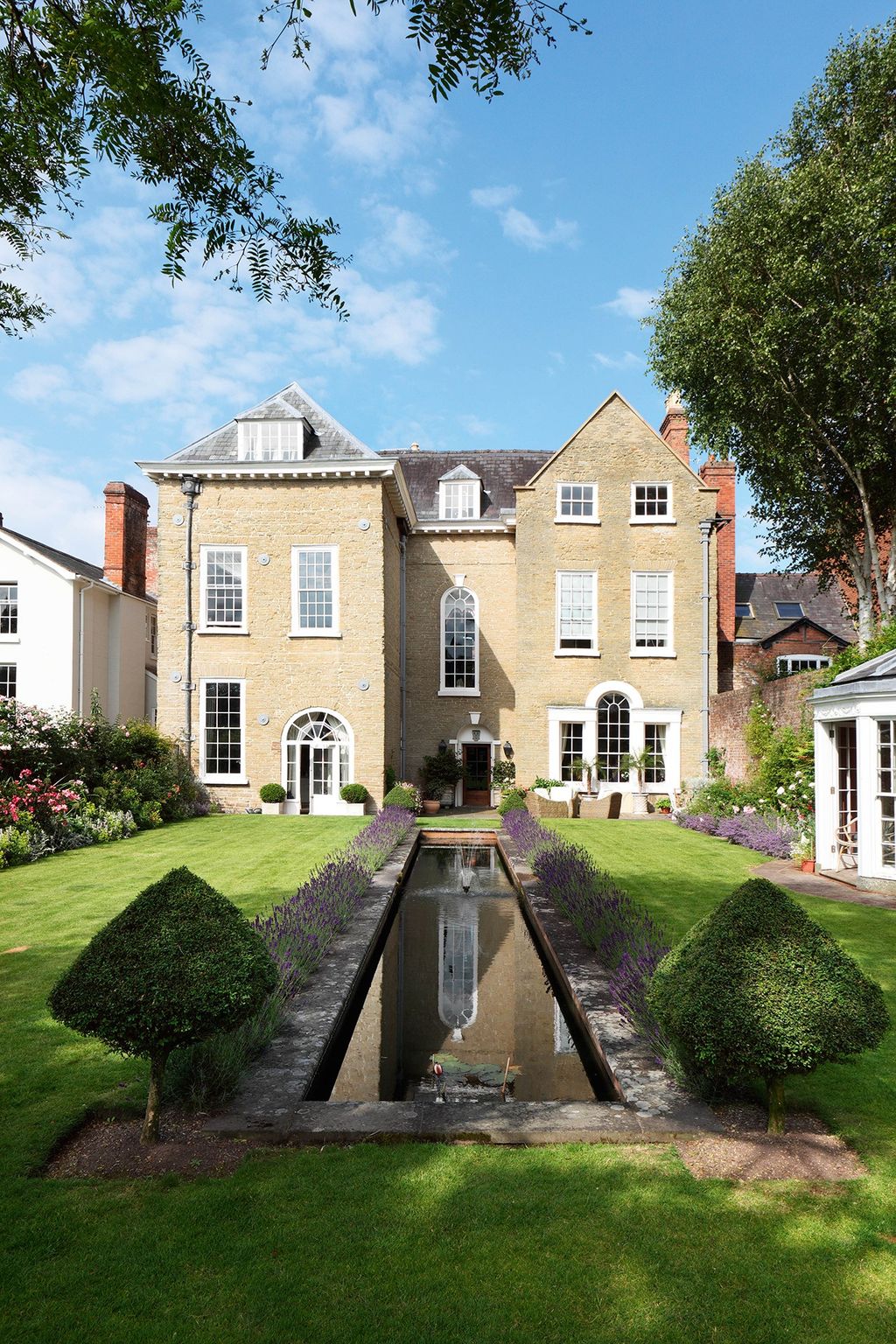 Image may contain Grass Plant Building Ditch Water Architecture Outdoors Housing Villa and House