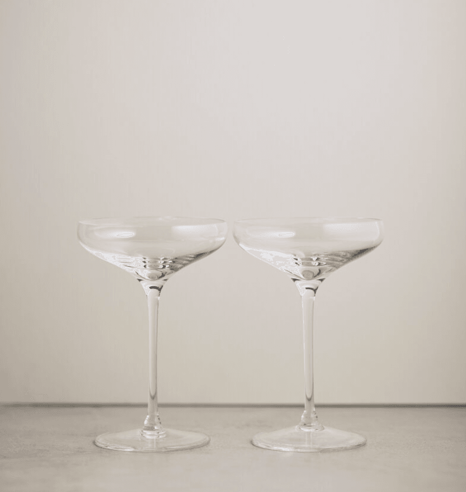 Image may contain Glass Goblet Drink Wine Glass Wine Alcohol Beverage and Lamp