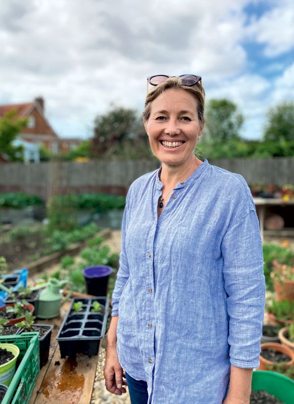 Clare in her vegetable garden.