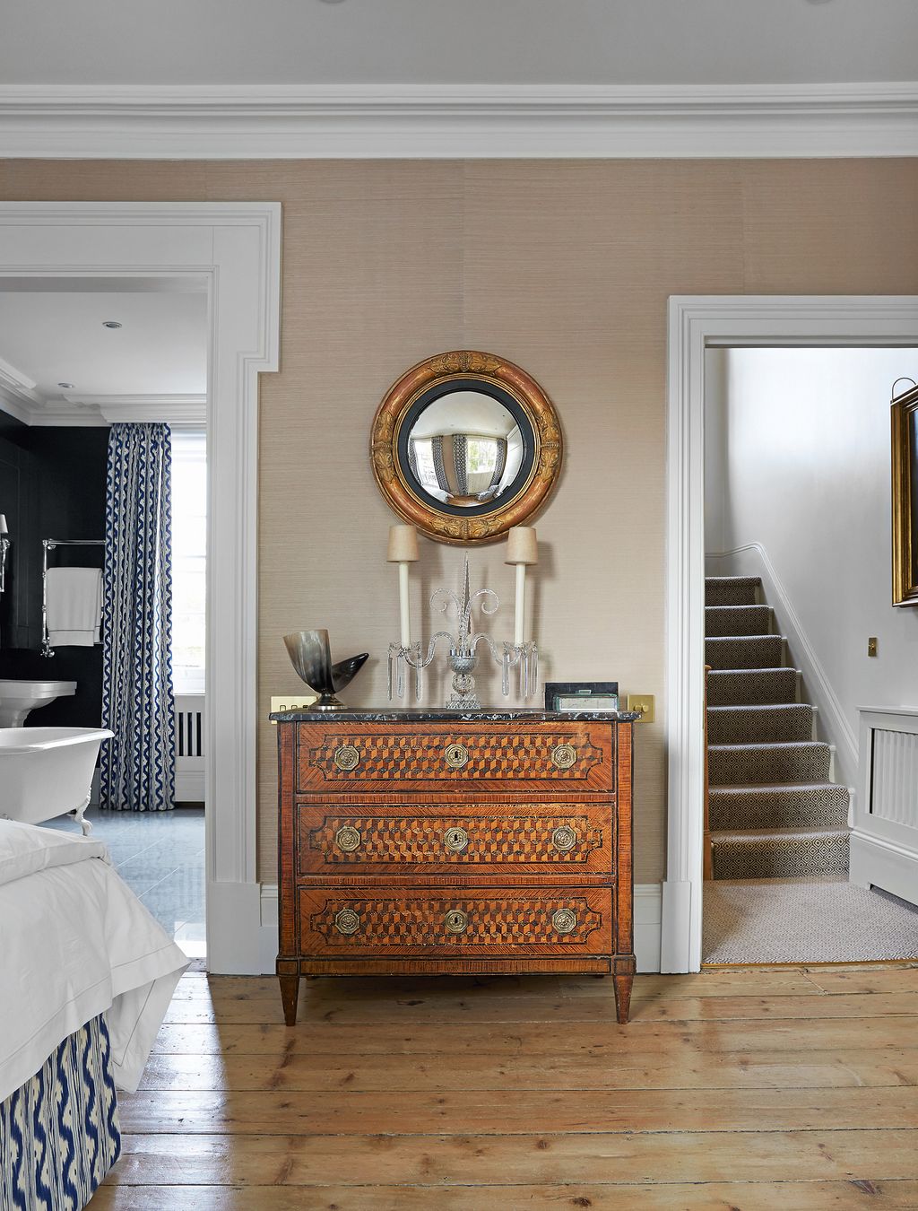 Image may contain Furniture Sideboard Interior Design Indoors Cabinet Dresser Flooring Wood Hardwood and Corner