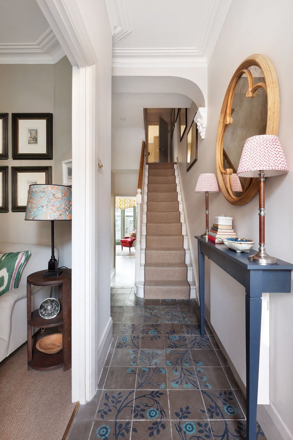 Image may contain Flooring Floor Living Room Room Indoors Banister Handrail Wood Interior Design and Staircase