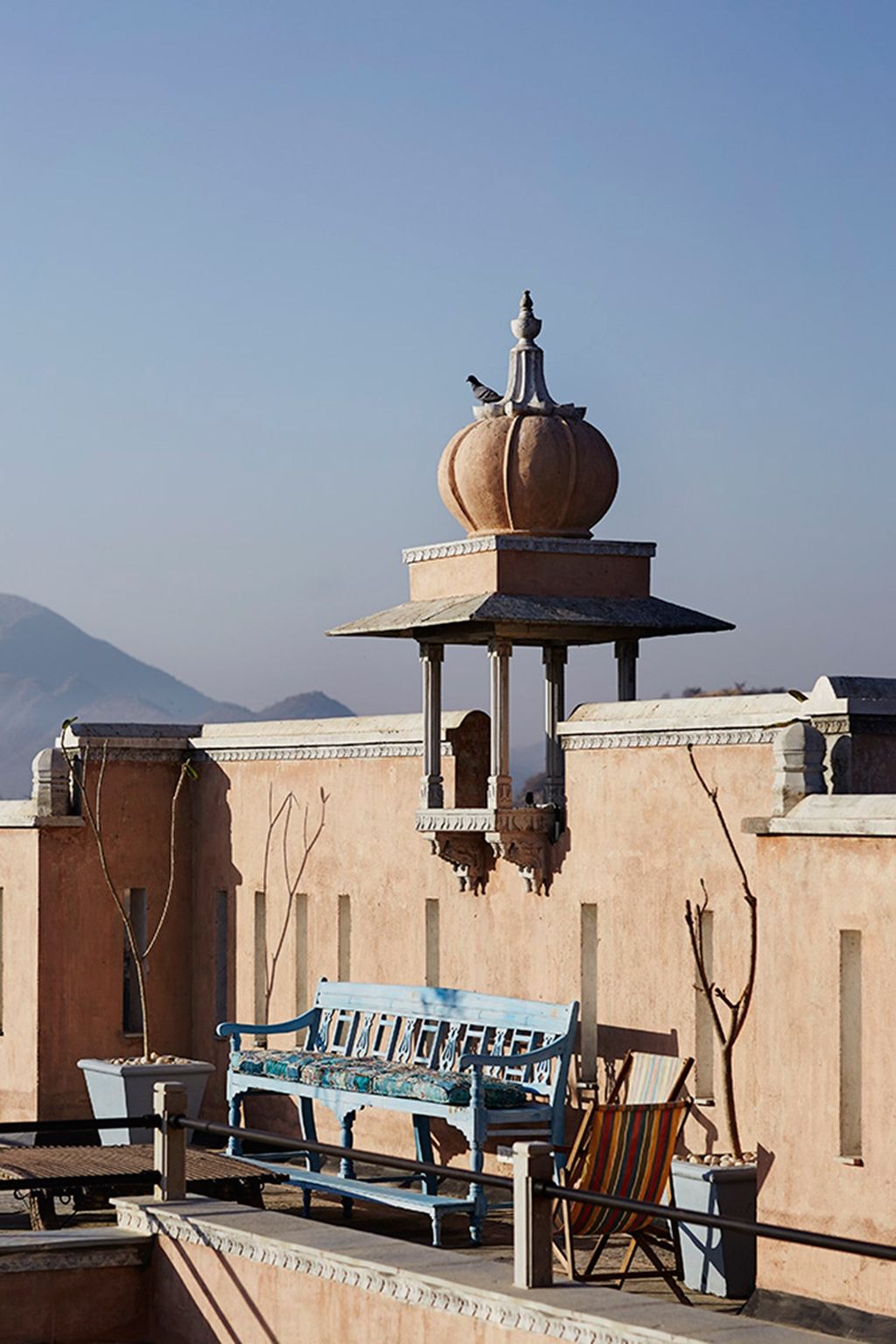 Image may contain Building Architecture Dome Furniture Chair and Bench