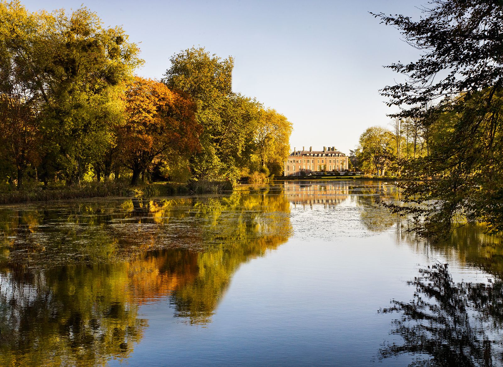 Image may contain Water Nature Outdoors Land Pond Lake Plant and Tree