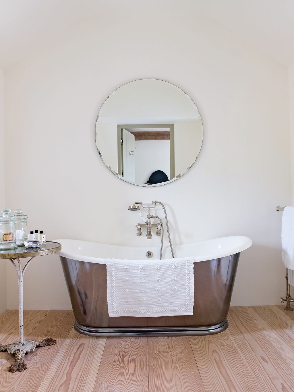 The bateau bath in this spare bathroom came from The Water Monopoly.