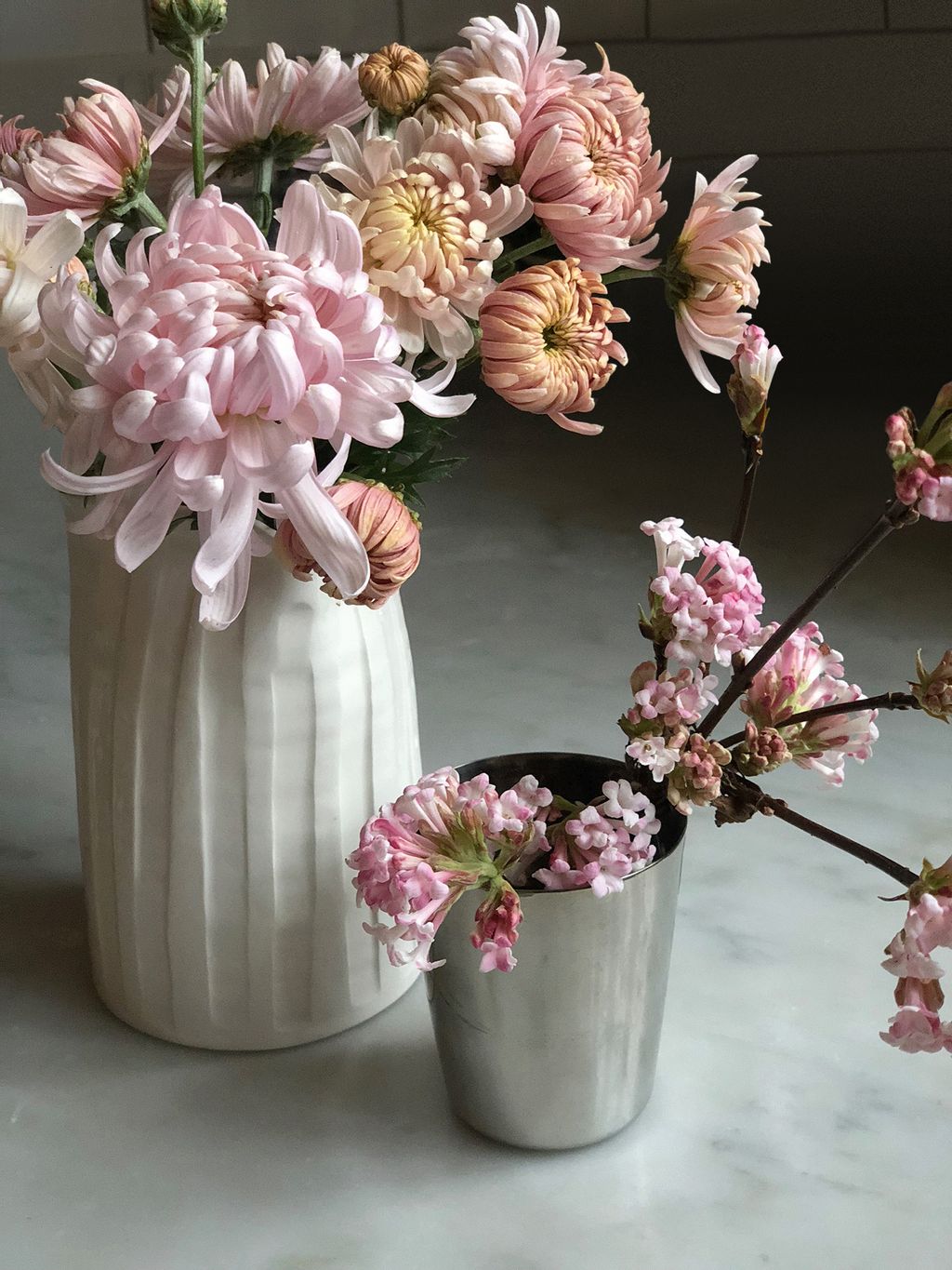 Image may contain Plant Human Person Flower Blossom Flower Arrangement and Flower Bouquet