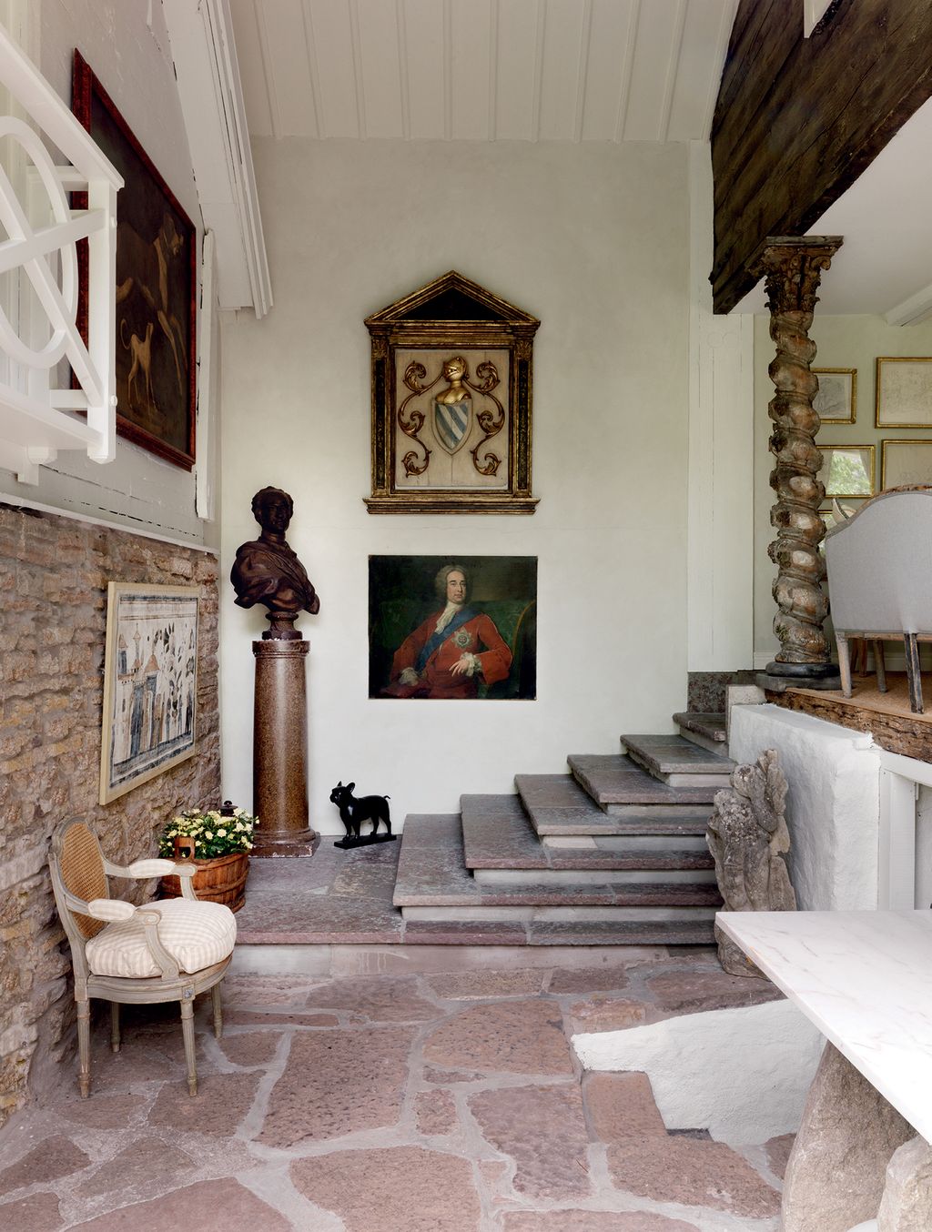 Image may contain Flooring Human Person Floor Wood Flagstone Banister Handrail Furniture Chair and Interior Design